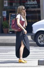 SIENNA MILLER Hails a Taxi in New York 05/02/2019