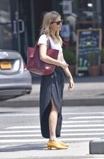 SIENNA MILLER Hails a Taxi in New York 05/02/2019