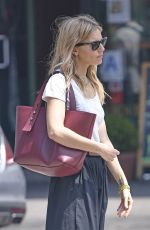 SIENNA MILLER Hails a Taxi in New York 05/02/2019