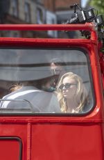 SOPHIE TURNER, JESSICA CHASTAIN and ALEXANDRA SHIPP Board a Red Bus in London 05/24/2019