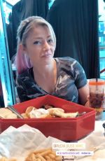 ALEXA BLISS at DC Super Heroes Cafe at Marina Bay - Instagram Pictures