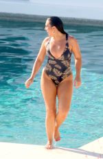 ALEXANDRA CANE in Swimsuit at a Pool in Mykonos 06/08/2019
