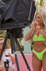 AMBER TURNER in Bikini at a Photoshoot in Ibiza 05/29/2019