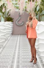AMBER TURNER in Bikini at a Photoshoot in Ibiza 05/29/2019