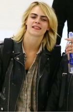ASHLEY BANSON and CARA DELEVINGNE at JFK Airport in New York 06/18/2019