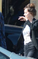 DAKOTA JOHNSON on the Set of Covers in Hollywood 06/05/2019