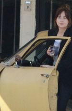 DAKOTA JOHNSON on the Set of Covers in Hollywood 06/05/2019
