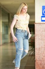 ELLE FANNING in Ripped Denim Out in Los Angeles 06/06/2019