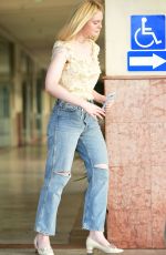 ELLE FANNING in Ripped Denim Out in Los Angeles 06/06/2019