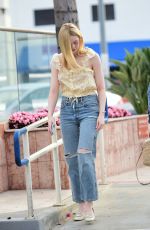 ELLE FANNING in Ripped Denim Out in Los Angeles 06/06/2019