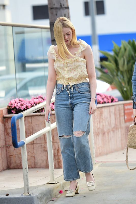 ELLE FANNING in Ripped Denim Out in Los Angeles 06/06/2019