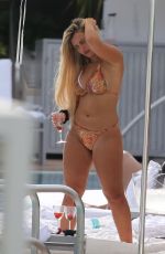 ELLIE BROWN in Bikini at Pool in Miami 06/13/2019