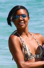 GABRIELLE UNION in Bikini at a Beach in Cannes 06/21/2019