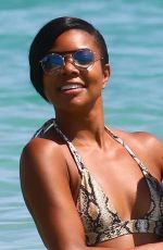 GABRIELLE UNION in Bikini at a Beach in Cannes 06/21/2019