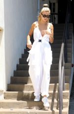 HAILEY BALDWIN in White Jumpsuit Out in Los Angeles 06/12/2019