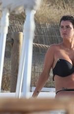 HELEN WOOD in Bikini on the Beach in Ibiza 06/25/2019