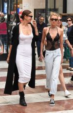 IRINA SHYAK and STELLA MAXWELL Holding Hands Out in Florence 06/14/2019