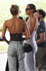 IRINA SHYAK and STELLA MAXWELL Holding Hands Out in Florence 06/14/2019