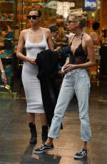 IRINA SHYAK and STELLA MAXWELL Holding Hands Out in Florence 06/14/2019