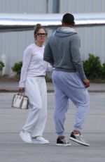 JENNIFER LOPEZ Kissing Alex Rodriguez at a Airport in Miami 06/01/2019