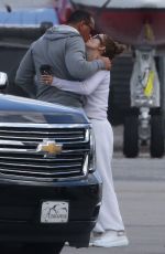 JENNIFER LOPEZ Kissing Alex Rodriguez at a Airport in Miami 06/01/2019