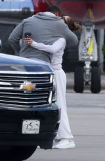 JENNIFER LOPEZ Kissing Alex Rodriguez at a Airport in Miami 06/01/2019