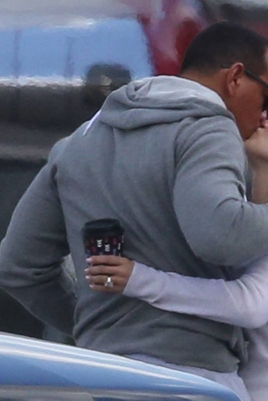 JENNIFER LOPEZ Kissing Alex Rodriguez at a Airport in Miami 06/01/2019