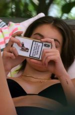 KAIA GERBER and CINDY CRAWFORD in Bikinis at a Pool in Miami 06/22/2019