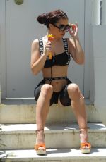 KATIE SALMON at a Photoshoot for Her Fans Site in Marbella 06/18/2019