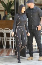 KIM and KOURTNEY KARDASHIAN at Cafe Gratitude in Los Angeles 06/05/2019