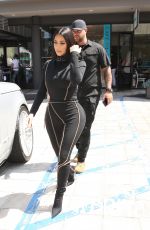 KIM and KOURTNEY KARDASHIAN at Cafe Gratitude in Los Angeles 06/05/2019