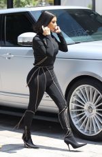 KIM and KOURTNEY KARDASHIAN at Cafe Gratitude in Los Angeles 06/05/2019