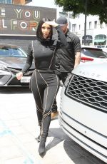 KIM and KOURTNEY KARDASHIAN at Cafe Gratitude in Los Angeles 06/05/2019