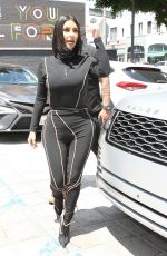 KIM and KOURTNEY KARDASHIAN at Cafe Gratitude in Los Angeles 06/05/2019