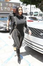 KIM and KOURTNEY KARDASHIAN at Cafe Gratitude in Los Angeles 06/05/2019