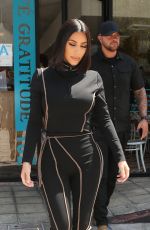 KIM and KOURTNEY KARDASHIAN at Cafe Gratitude in Los Angeles 06/05/2019