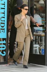 KIM and KOURTNEY KARDASHIAN at Cafe Gratitude in Los Angeles 06/05/2019
