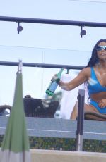 KIM KARDASHIAN in Bikini at a Pool in Costa Rica 06/21/2019