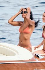 LAURA HARRIER and ELEONORE TOULIN in Bikinis at a Boat in Positano 06/17/2019