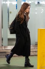 LILY COLLINS at Heathrow Airport in London 04/24/2019