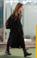 LILY COLLINS at Heathrow Airport in London 04/24/2019