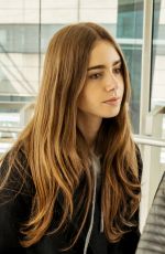 LILY COLLINS at Heathrow Airport in London 04/24/2019