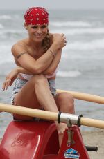 MICHELLE HUNZIKER and AURORA RAMAZOTTI on the Beach in Varigotti 05/16/2019