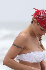 MICHELLE HUNZIKER and AURORA RAMAZOTTI on the Beach in Varigotti 05/16/2019
