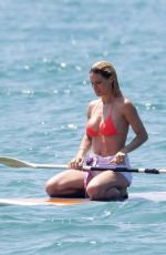 MICHELLE HUNZIKER in Bikini Paddlboarding in Forte Dei Marmi 06/17/2019