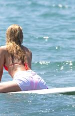 MICHELLE HUNZIKER in Bikini Paddlboarding in Forte Dei Marmi 06/17/2019
