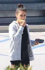 MILA KUNIS Eating Apple Out in Beverly Hills 06/27/2019