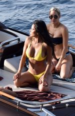NICOLE SCHERZINGER in Yellow Bikini at a Boat in Capri 06/15/2019