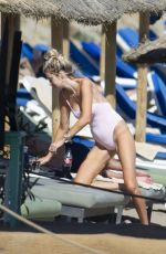 OLIVIA ATTWOOD in Swimsuit on the Beach in Marbella 06/10/2019