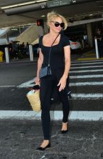 PAMELA ANDERSON Arrives at LAX Airport in Los Angeles 06/05/2019